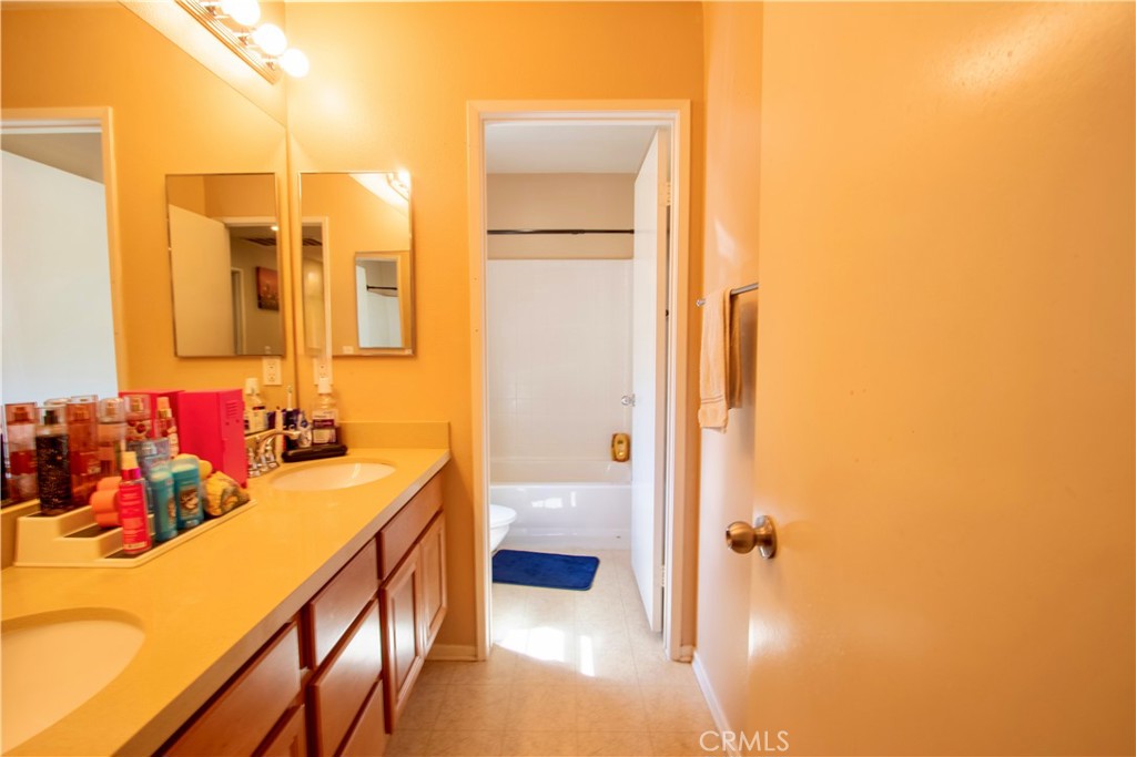 8090 Cornwall Court, Unit 38 Rancho Cucamonga, CA 91739 - Photo 32 of 47 a bathroom with a bathtub and a sink