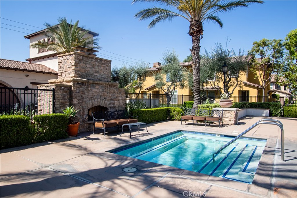 8090 Cornwall Court, Unit 38 Rancho Cucamonga, CA 91739 - Photo 41 of 47 a view of a patio with couches table and chairs
