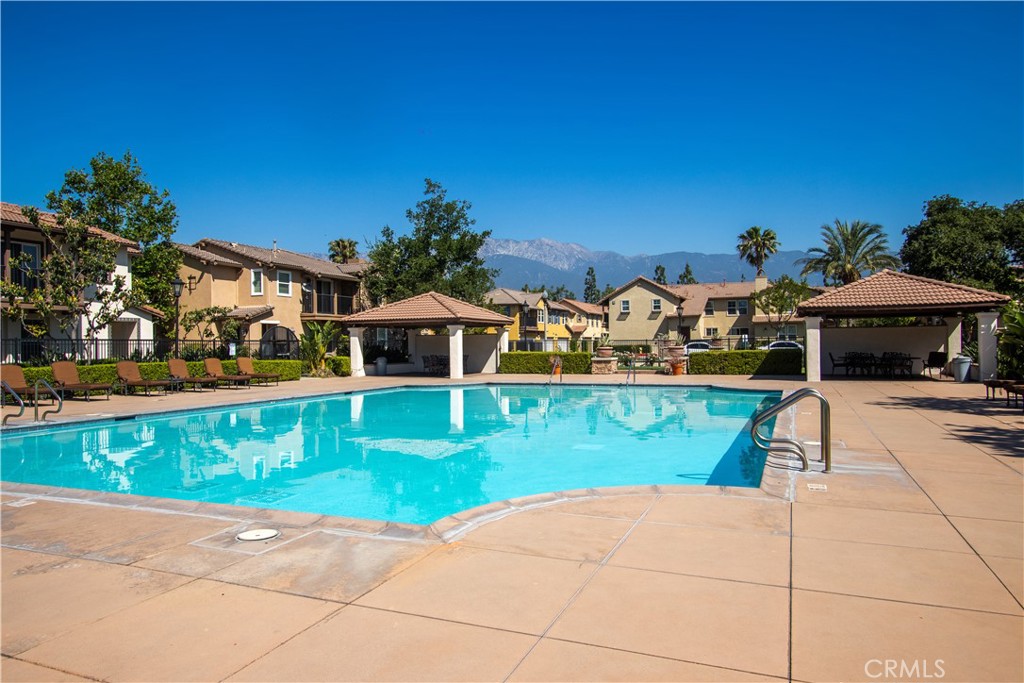 8090 Cornwall Court, Unit 38 Rancho Cucamonga, CA 91739 - Photo 42 of 47 a front view of house with yard