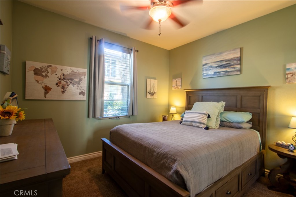 8090 Cornwall Court, Unit 38 Rancho Cucamonga, CA 91739 - Photo 9 of 47 a bedroom with a bed and window