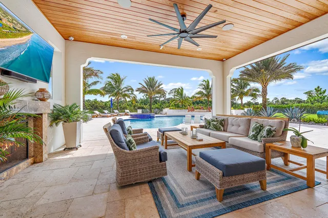 a bedroom with a bed potted plant on table and a window