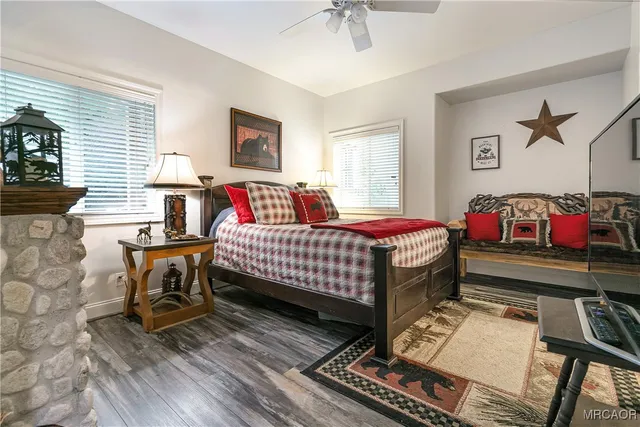 a bedroom with a bed and a table