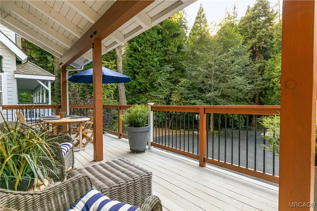 a view of balcony with furniture