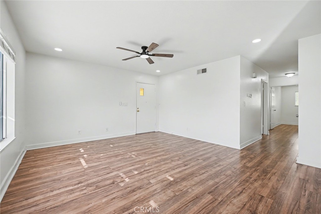 23517 Twin Spring Lane Diamond Bar, CA 91765 - Photo 14 of 40 a view of empty room with wooden floor and fan