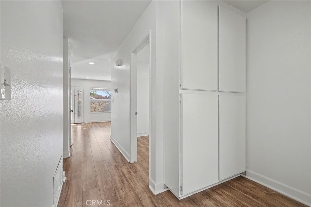 23517 Twin Spring Lane Diamond Bar, CA 91765 - Photo 24 of 40 a view of a hallway with wooden floor