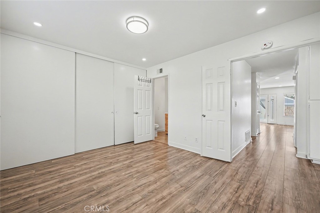 23517 Twin Spring Lane Diamond Bar, CA 91765 - Photo 26 of 40 a view of a hallway with wooden floor