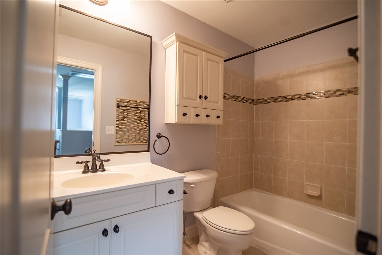 3736 Falls River Avenue Raleigh, NC 27614 - Photo 28 of 30 Conveniently located on 3rd floor. Features vanity and shower/tub combo. Bathroom