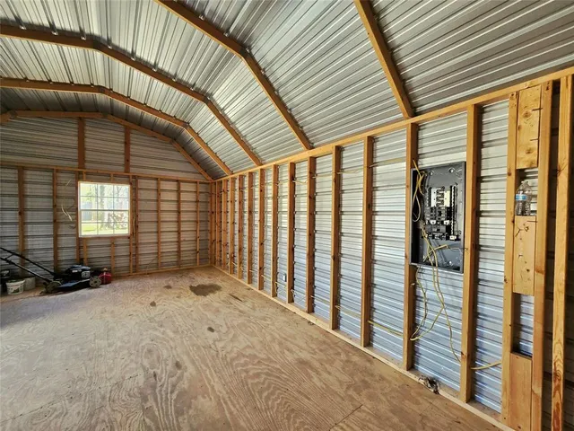 a view of a big room with large windows