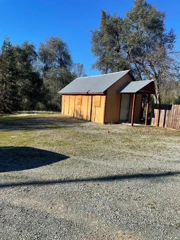 a view of a backyard with a mountain