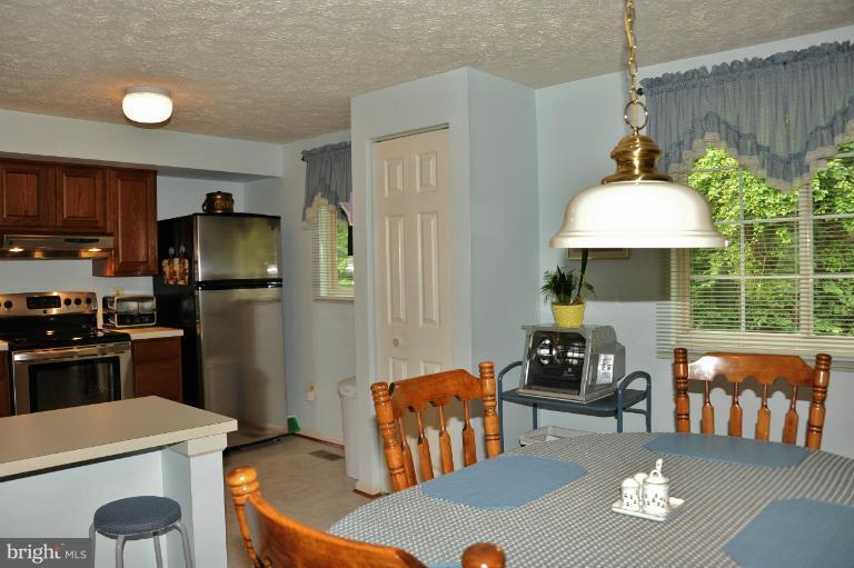 7554 Aspenpark Road Lorton, VA 22079 - Photo 21 of 30 Dining Room - Kitchen