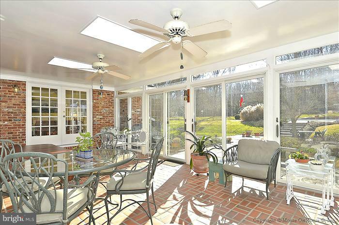 3232 Fox Mill Road Oakton, VA 22124 - Photo 7 of 30 The table-space kitchen also leads to the sunroom