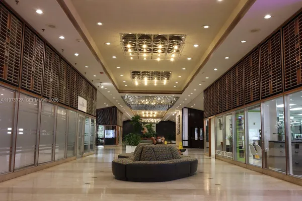 a large living room with large windows