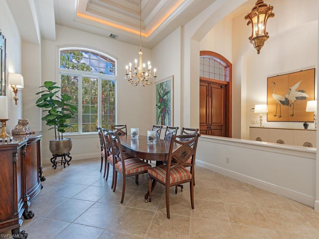 5140 Tamarind Ridge Drive Naples, FL 34119 - Photo 6 of 25 Expansive living area with high vaulted ceilings and crown molding