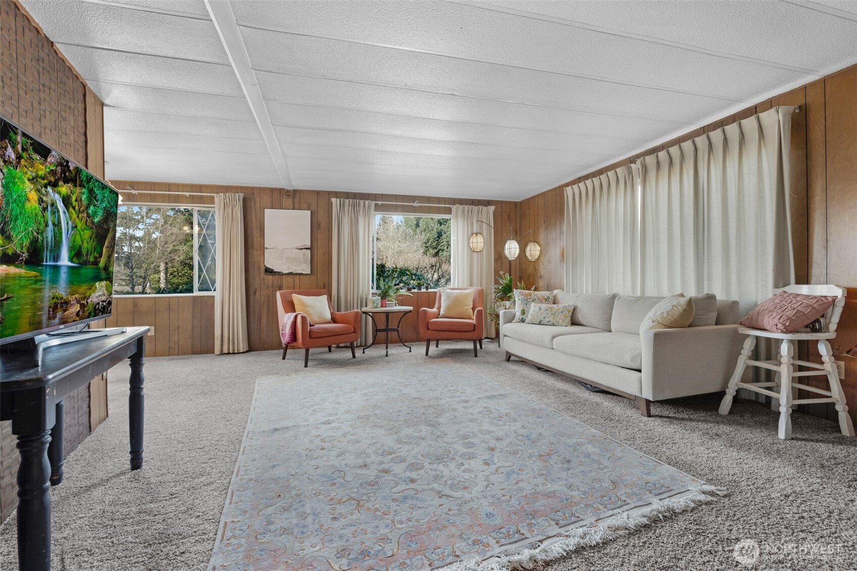2200 196th Street Southeast, Unit 76 Bothell, WA 98012 - Photo 12 of 27 a living room with furniture and a large window