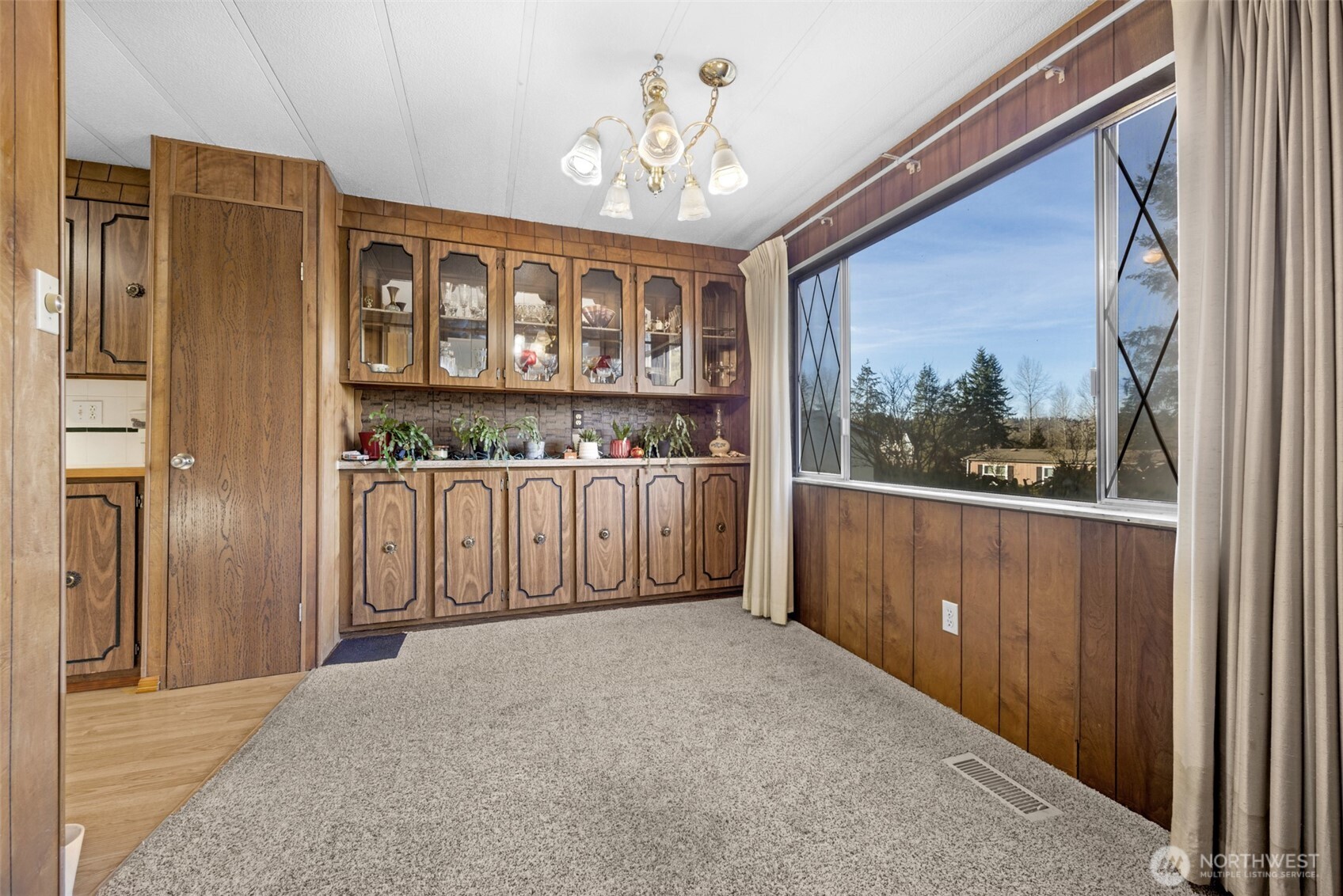 2200 196th Street Southeast, Unit 76 Bothell, WA 98012 - Photo 16 of 27 a view of a hallway with a window