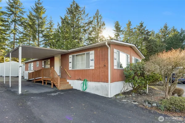 a house with trees in the background