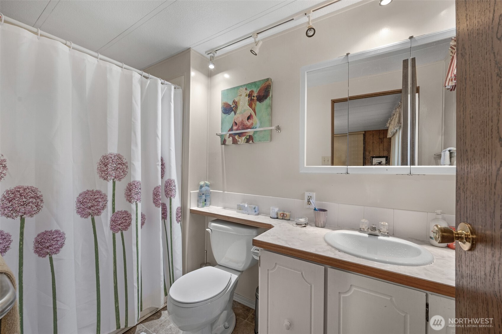 2200 196th Street Southeast, Unit 76 Bothell, WA 98012 - Photo 21 of 27 a bathroom with a sink toilet and shower