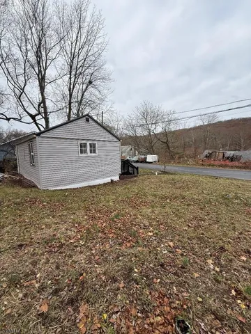 a big house with lots of trees