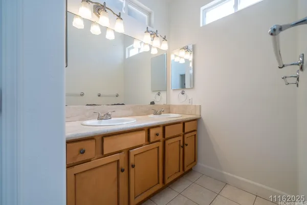 a white bath tub sitting next to a white toilet