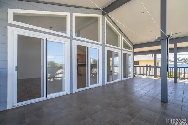 an open kitchen with a sink and cabinets