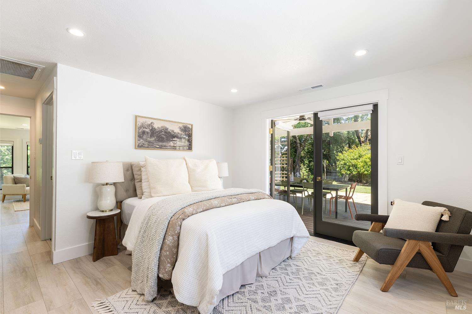 14734 Young Road Healdsburg, CA 95448 - Photo 43 of 47 a bedroom with a bed a table and chair
