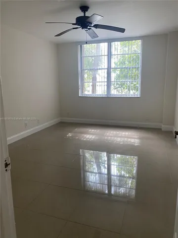 a room with furniture and a mirror