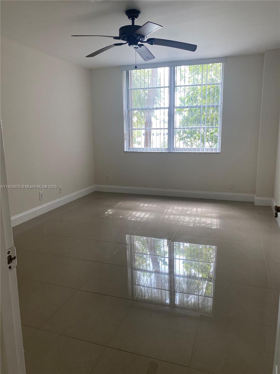 1625 Southeast 10th Avenue, Unit 205 Fort Lauderdale, FL 33316 - Photo 15 of 32 an empty room with a window
