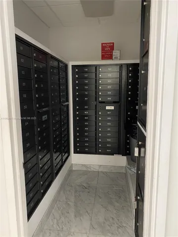 a room with gym equipment and windows