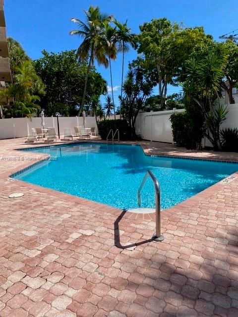1625 Southeast 10th Avenue, Unit 205 Fort Lauderdale, FL 33316 - Photo 25 of 32 a view of a swimming pool with a patio