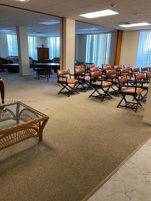 1625 Southeast 10th Avenue, Unit 205 Fort Lauderdale, FL 33316 - Photo 29 of 32 a living room with furniture a window and a flat screen tv