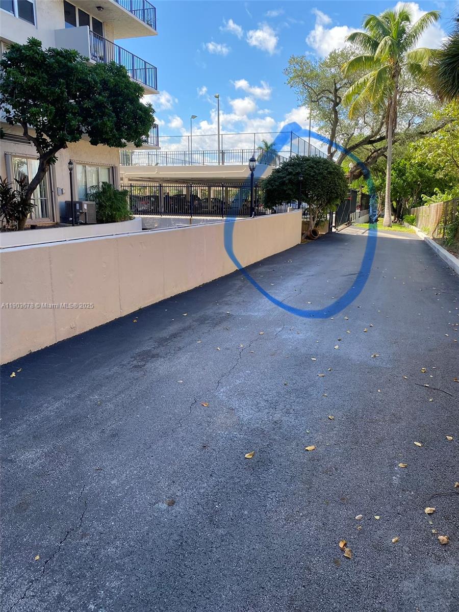 1625 Southeast 10th Avenue, Unit 205 Fort Lauderdale, FL 33316 - Photo 30 of 32 a view of a big yard with potted plants