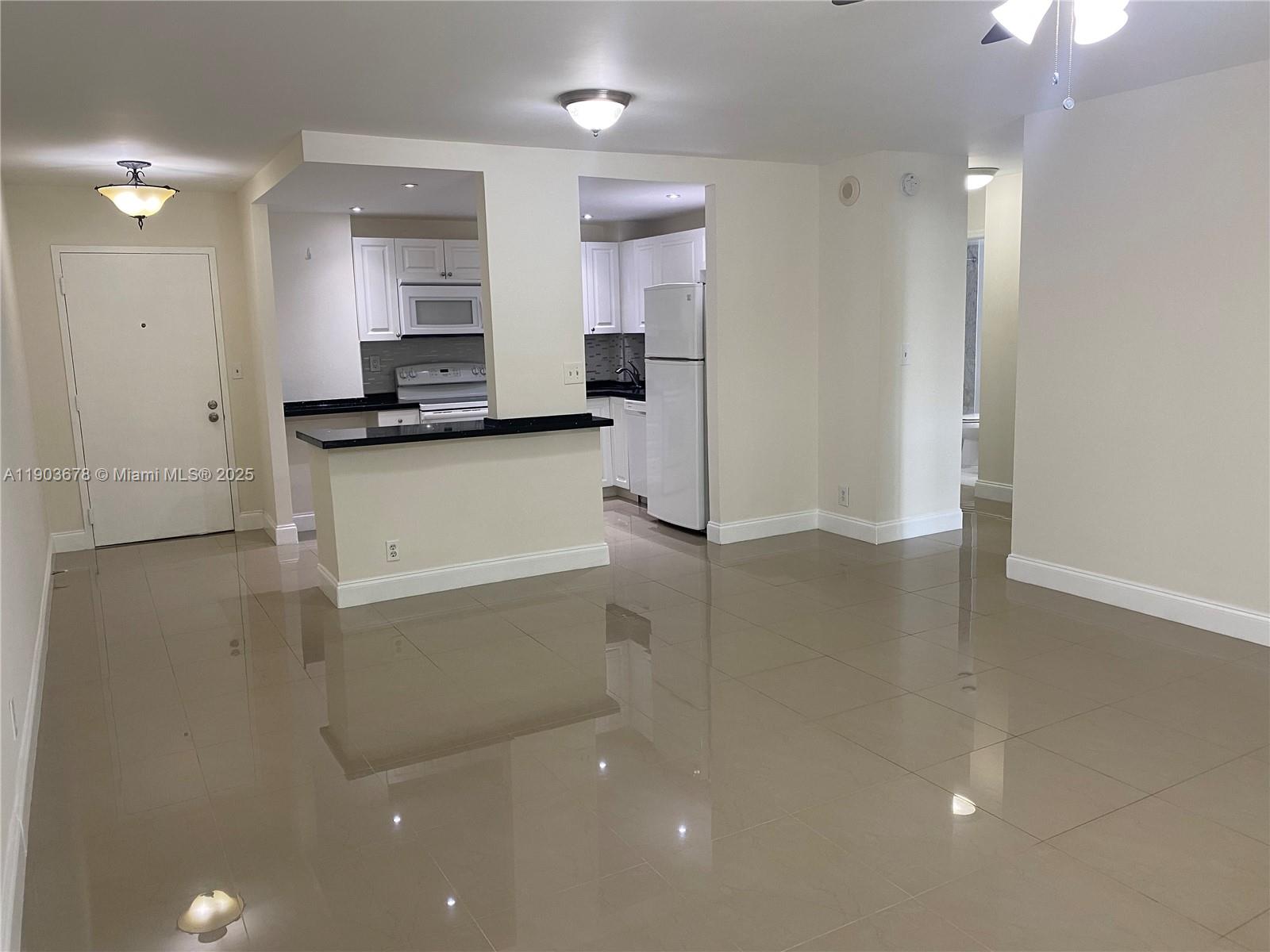 1625 Southeast 10th Avenue, Unit 205 Fort Lauderdale, FL 33316 - Photo 3 of 32 a view of a kitchen with a sink