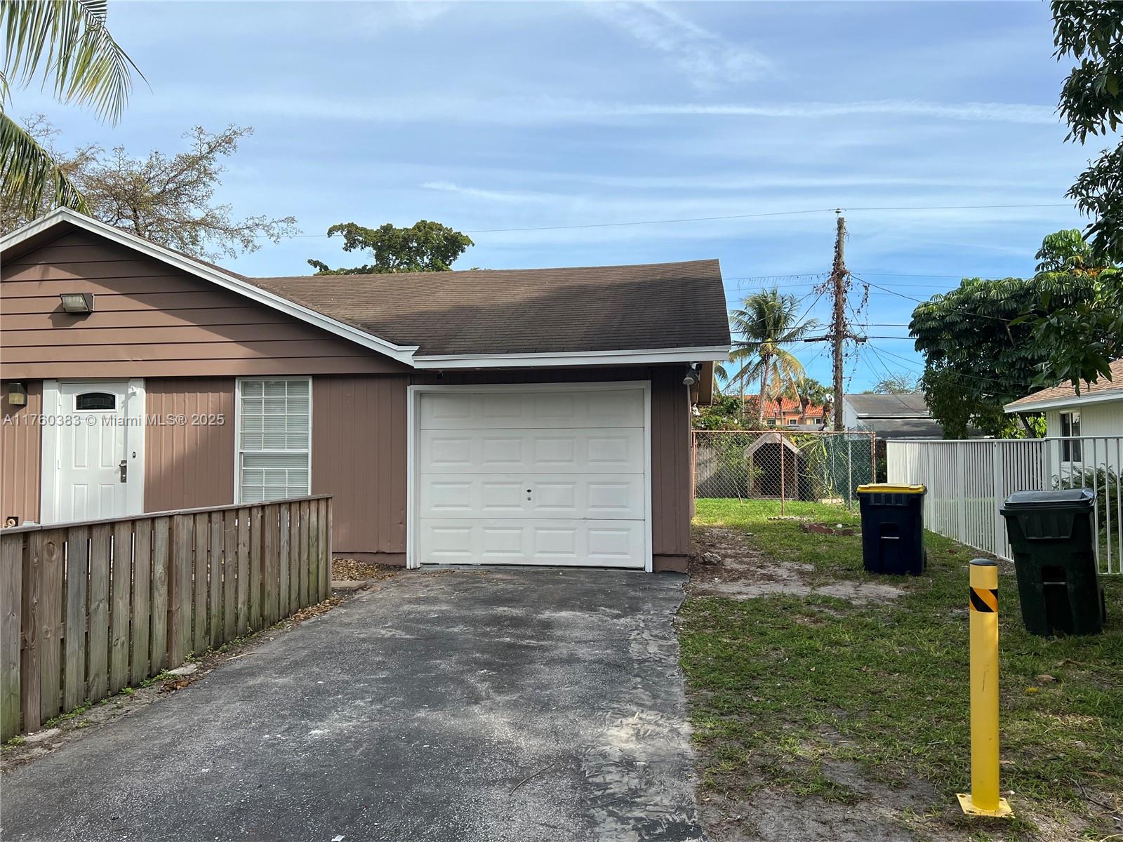 Dania Beach Dania Beach, FL 33312 - Photo 16 of 20 a backyard of a house with lots of green space