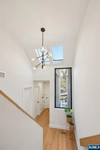 a view of a hallway with a window