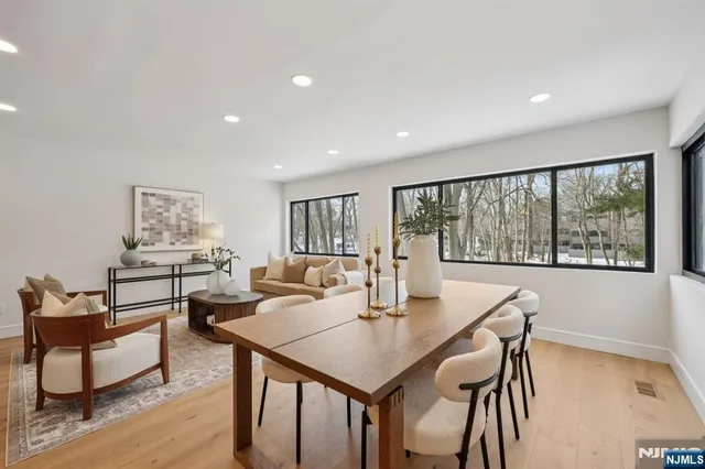 a view of a dining room with furniture window and outside view