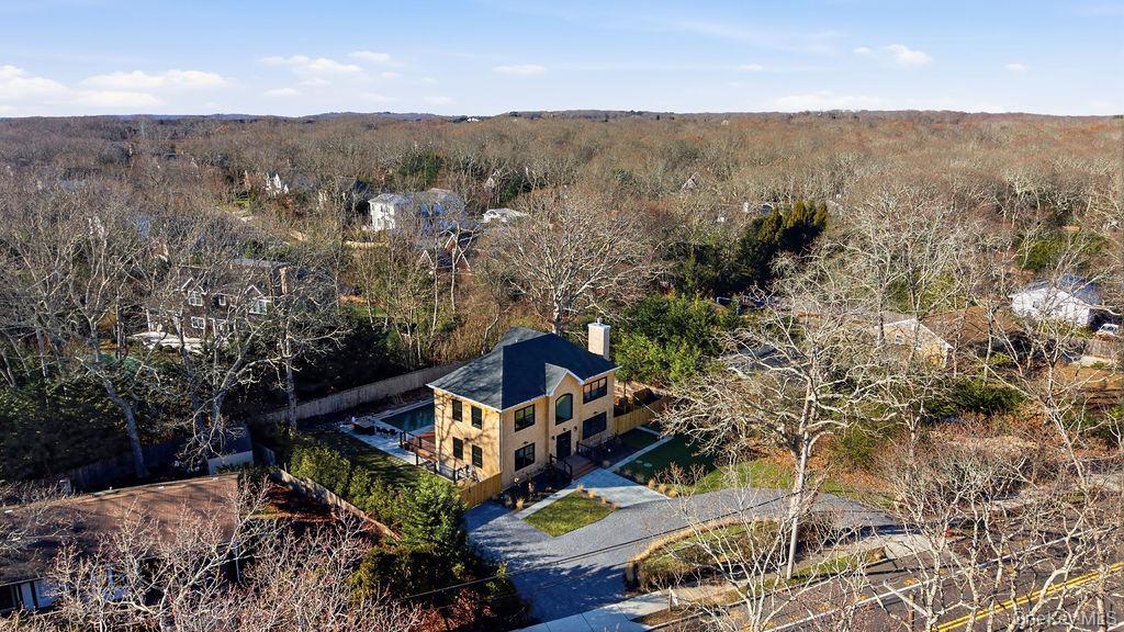 768 Bridgehampton Sag Harbor Bridgehampton, NY 11932 - Photo 6 of 35 View from above of property featuring a heavily wooded area