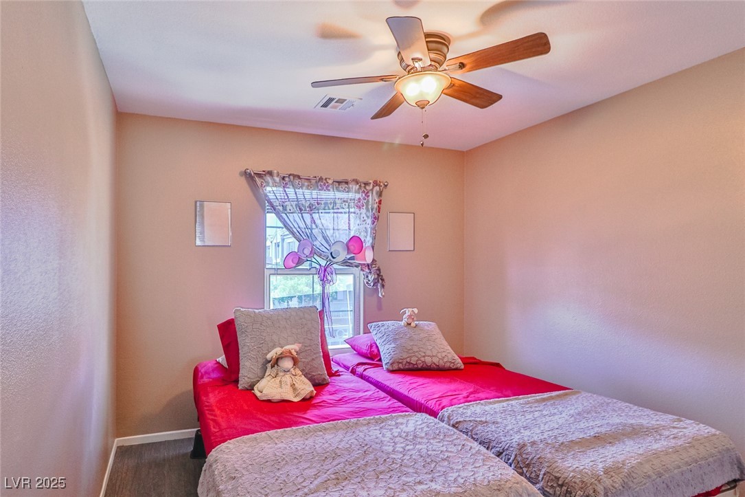 9068 West Alluring Avenue Las Vegas, NV 89149 - Photo 34 of 48 Bedroom with baseboards and ceiling fan