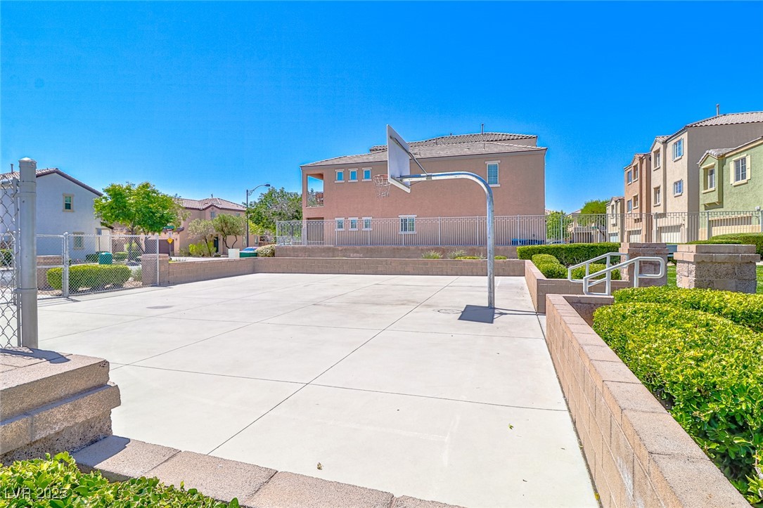 9068 West Alluring Avenue Las Vegas, NV 89149 - Photo 43 of 48 View of sport court with a residential view and community basketball court