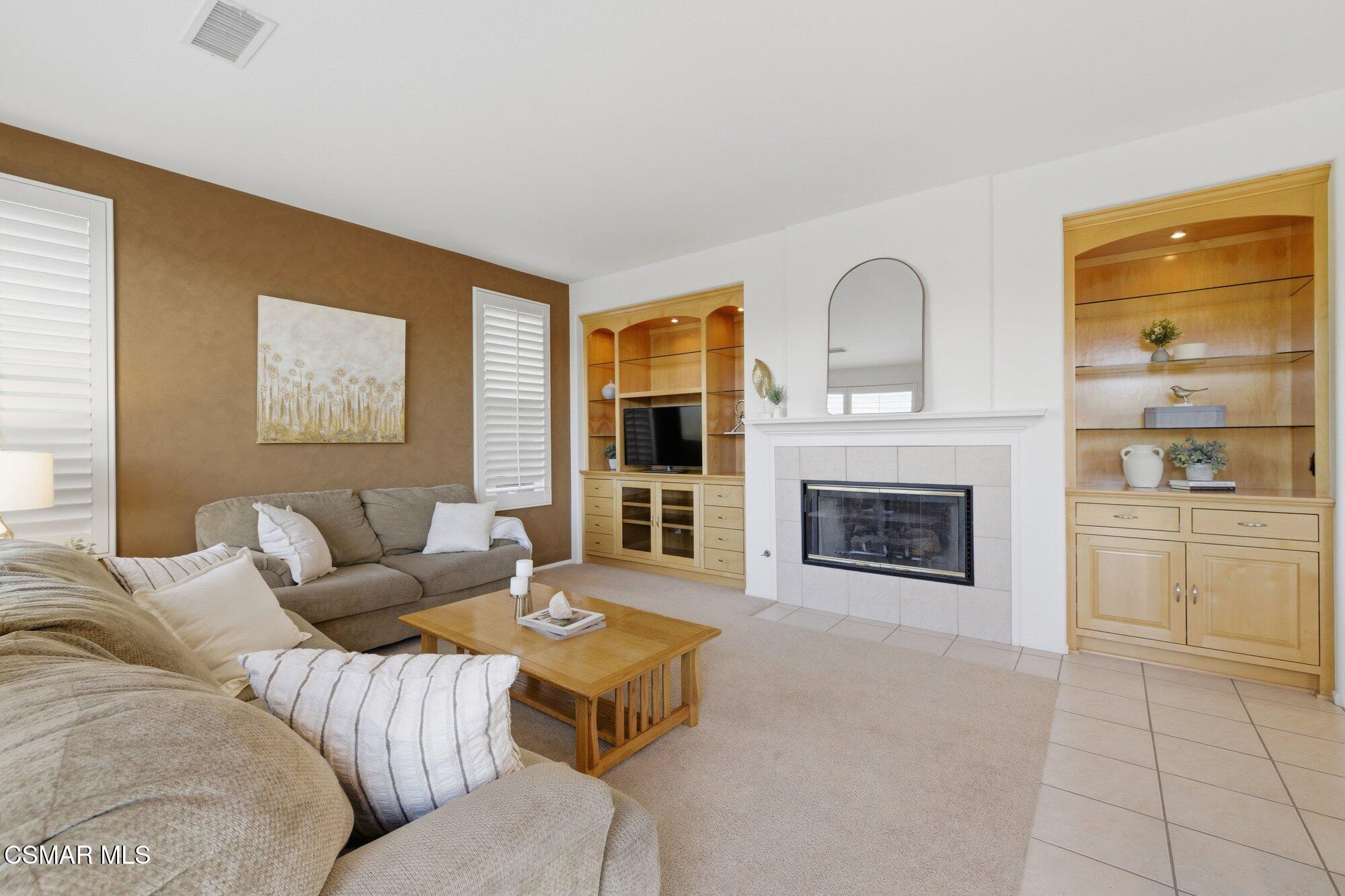 3205 Pine View Drive Simi Valley, CA 93065 - Photo 20 of 72 a living room with furniture and a fireplace