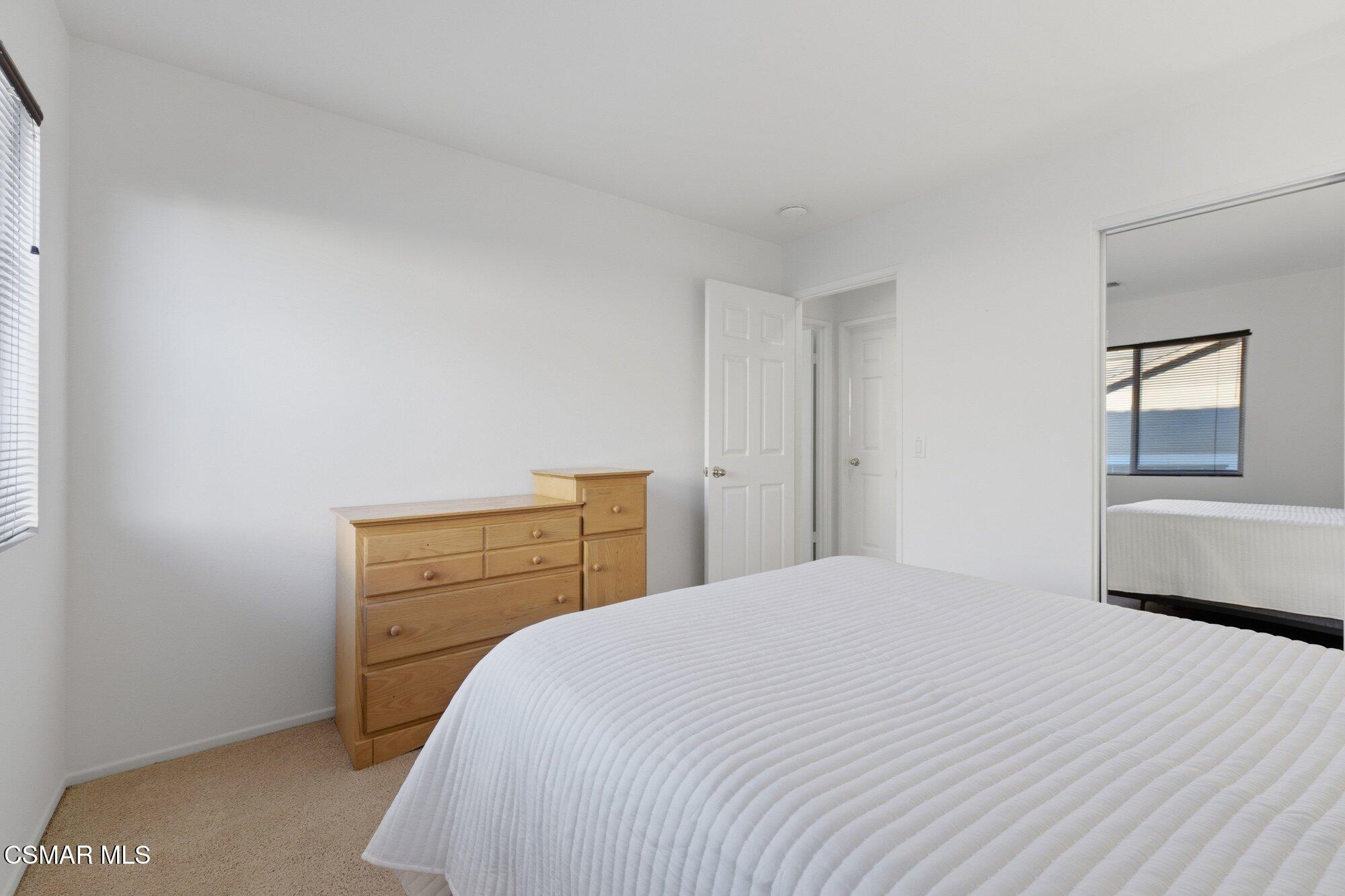 3205 Pine View Drive Simi Valley, CA 93065 - Photo 28 of 72 a bedroom with a bed and a dresser