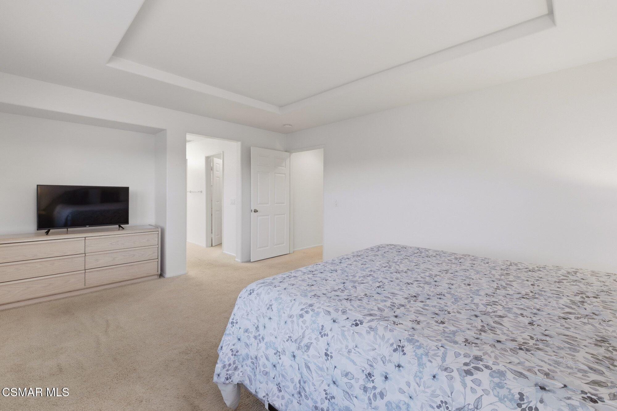 3205 Pine View Drive Simi Valley, CA 93065 - Photo 34 of 72 a bedroom with a bed and a flat screen tv