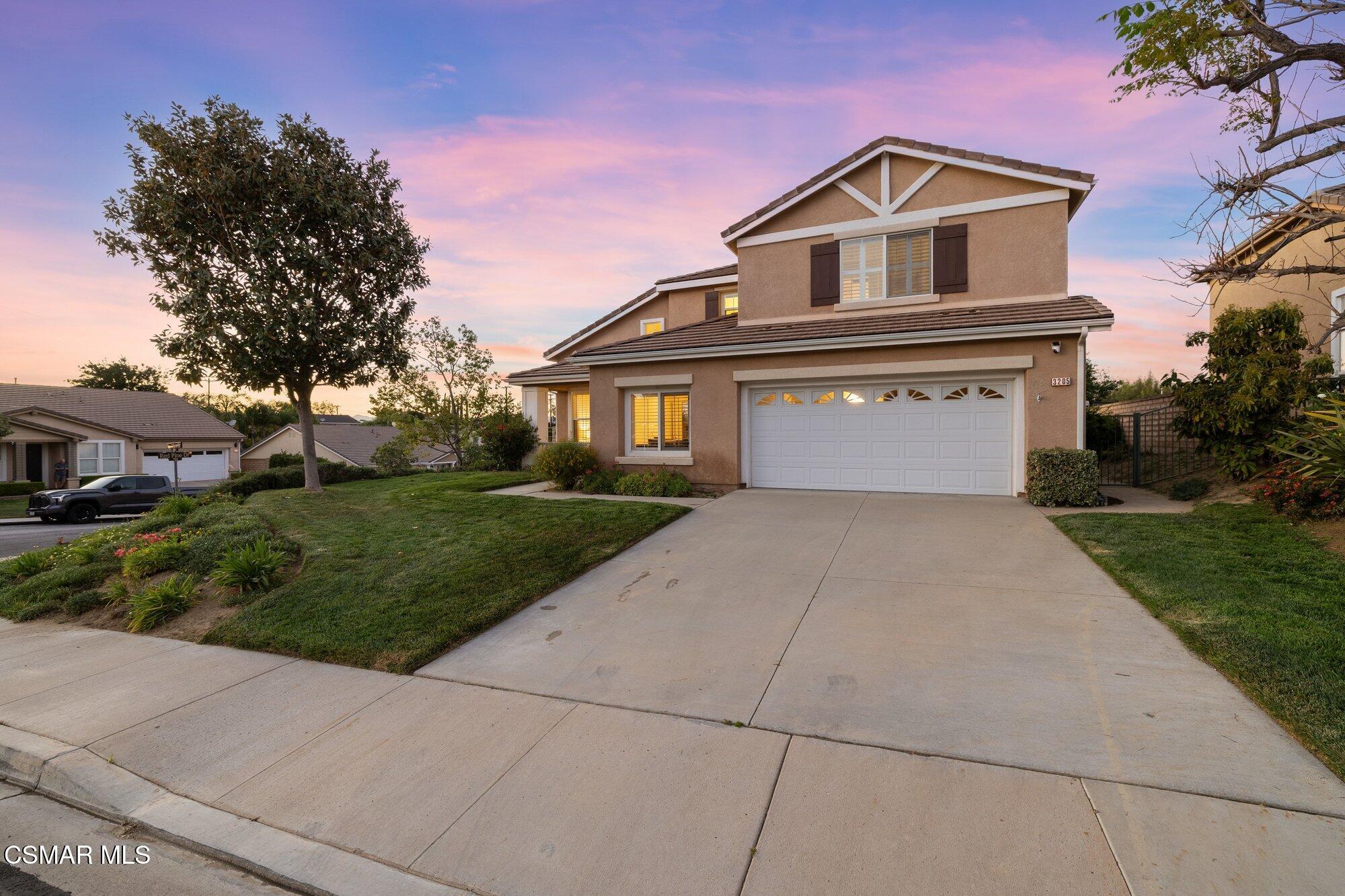 3205 Pine View Drive Simi Valley, CA 93065 - Photo 51 of 72 a front view of a house with a yard