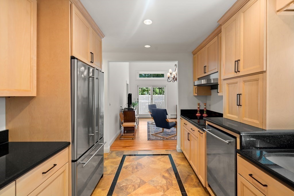 6 Dean Road Marblehead, MA 01945 - Photo 12 of 29 a kitchen with stainless steel appliances a refrigerator and a stove