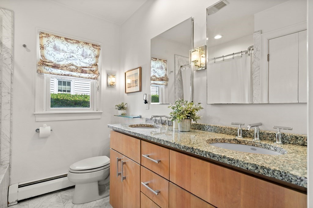 6 Dean Road Marblehead, MA 01945 - Photo 19 of 29 a bathroom with a granite countertop sink mirror vanity and toilet