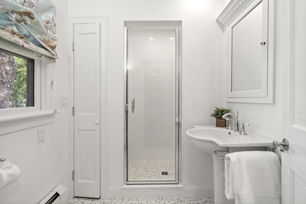 6 Dean Road Marblehead, MA 01945 - Photo 23 of 29 a bathroom with a sink and a mirror