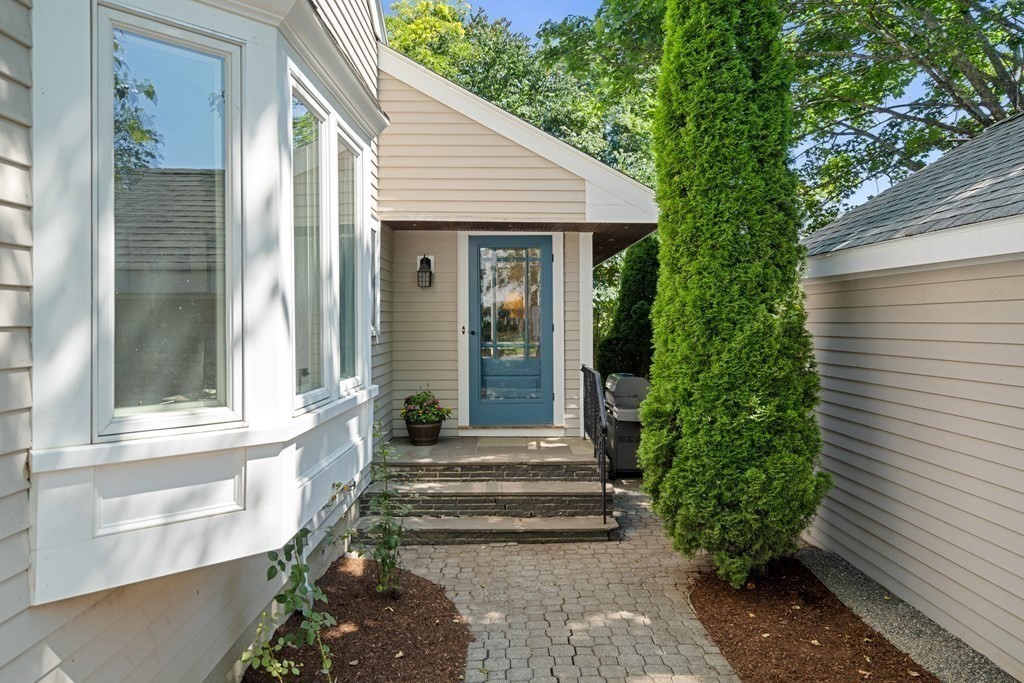 6 Dean Road Marblehead, MA 01945 - Photo 26 of 29 a front view of a house with garden