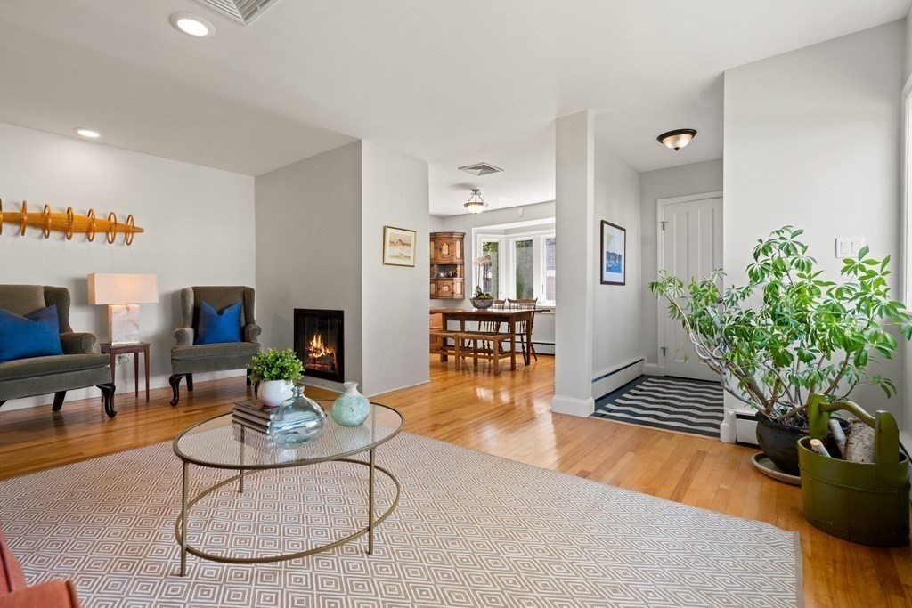 6 Dean Road Marblehead, MA 01945 - Photo 4 of 29 a living room with fireplace furniture and a potted plant