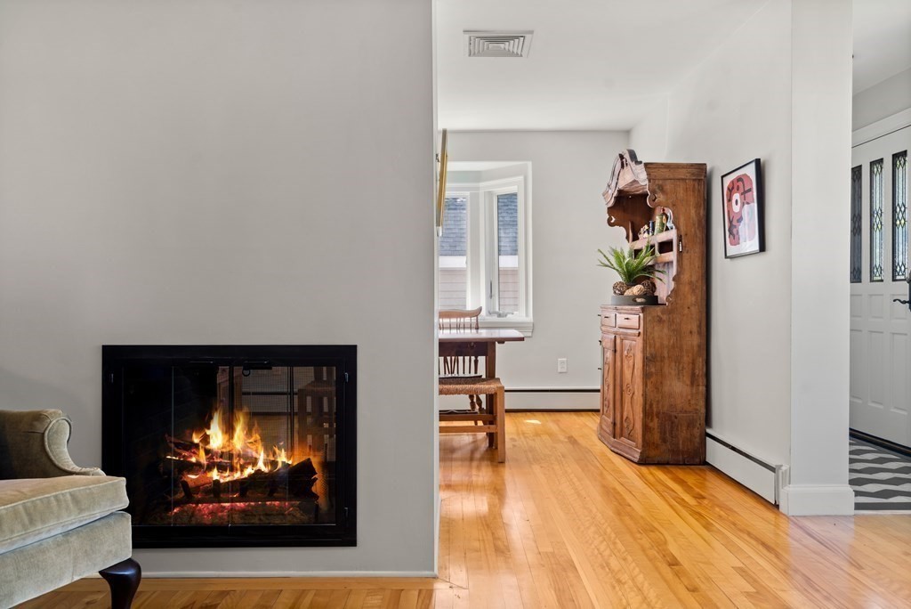 6 Dean Road Marblehead, MA 01945 - Photo 5 of 29 a living room with furniture and a fireplace