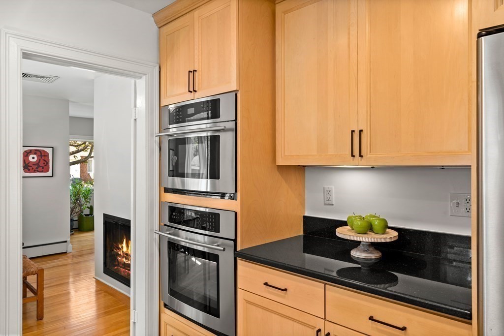 6 Dean Road Marblehead, MA 01945 - Photo 10 of 29 a kitchen with stainless steel appliances granite countertop white cabinets and a granite counter tops