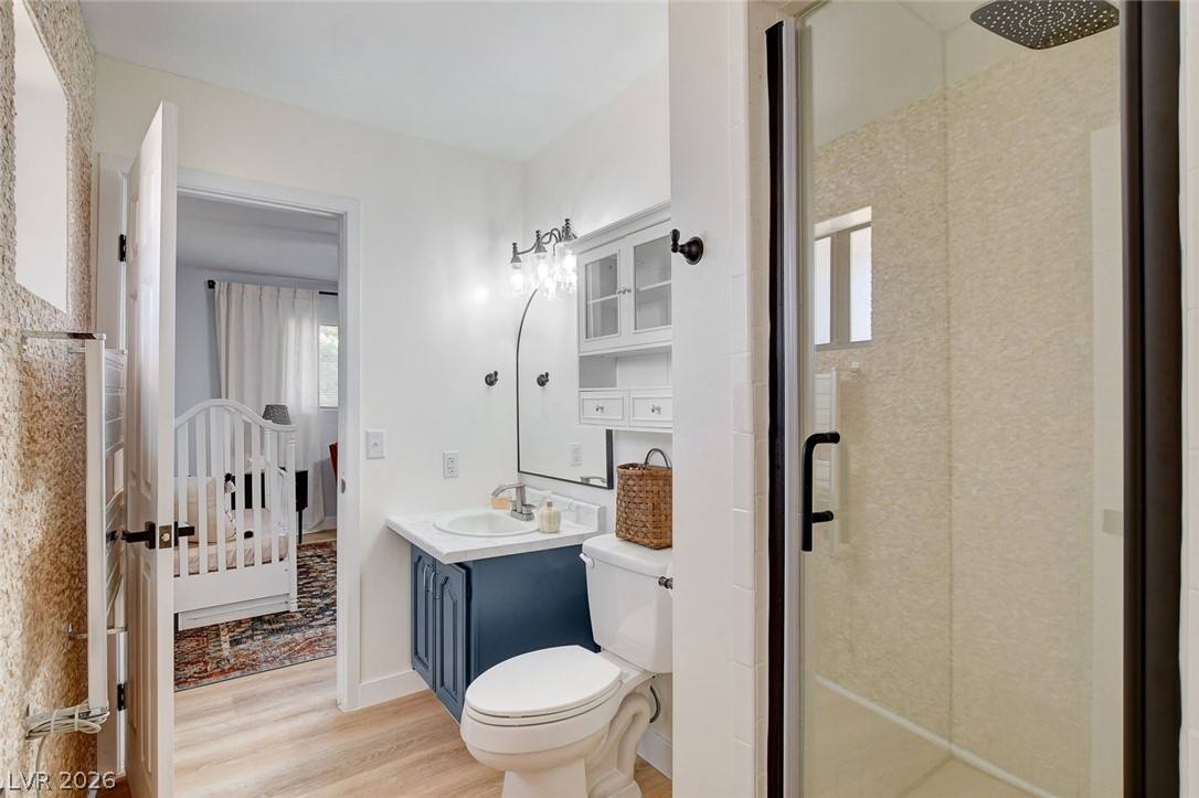 3765 Berkeley Street Logandale, NV 89021 - Photo 44 of 87 This bright bathroom features a modern vanity and a spacious shower.